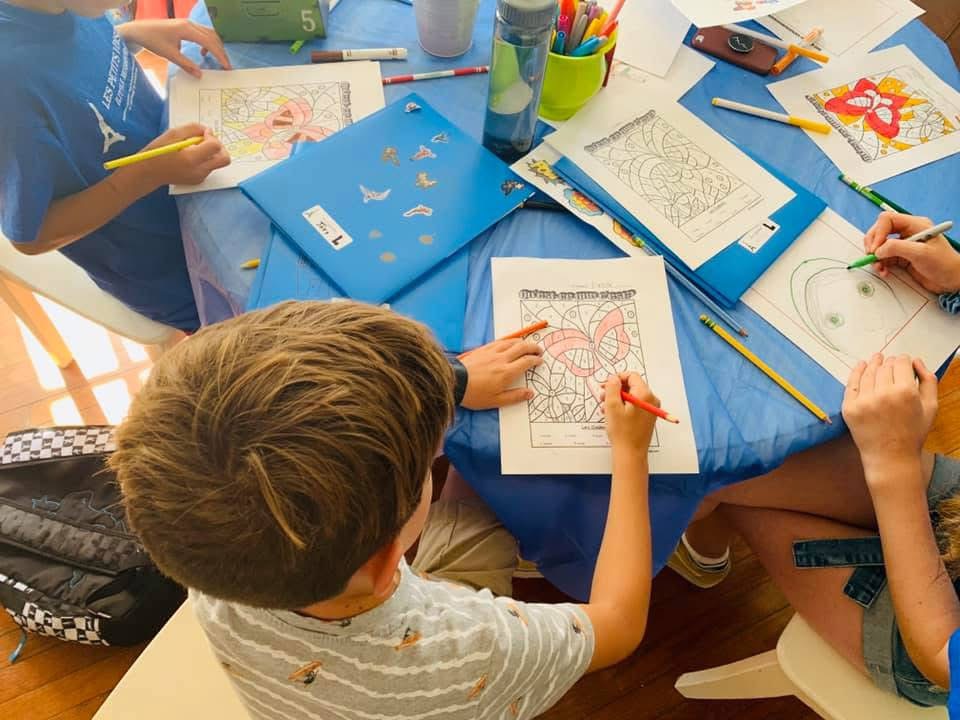 A French instructor and student learning together